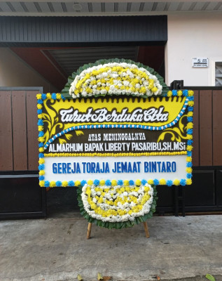 Papan Bunga Duka di Janah Mansiwui